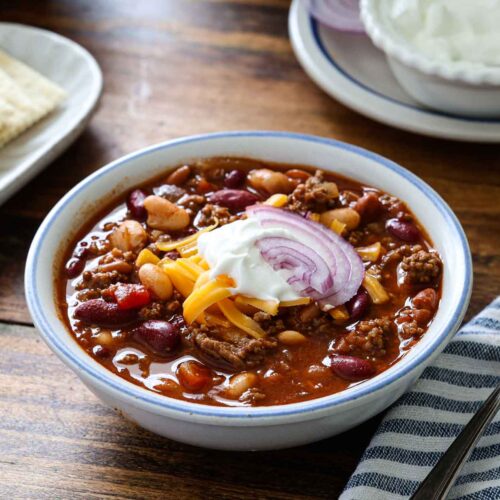 Bowl of soup with toppings.