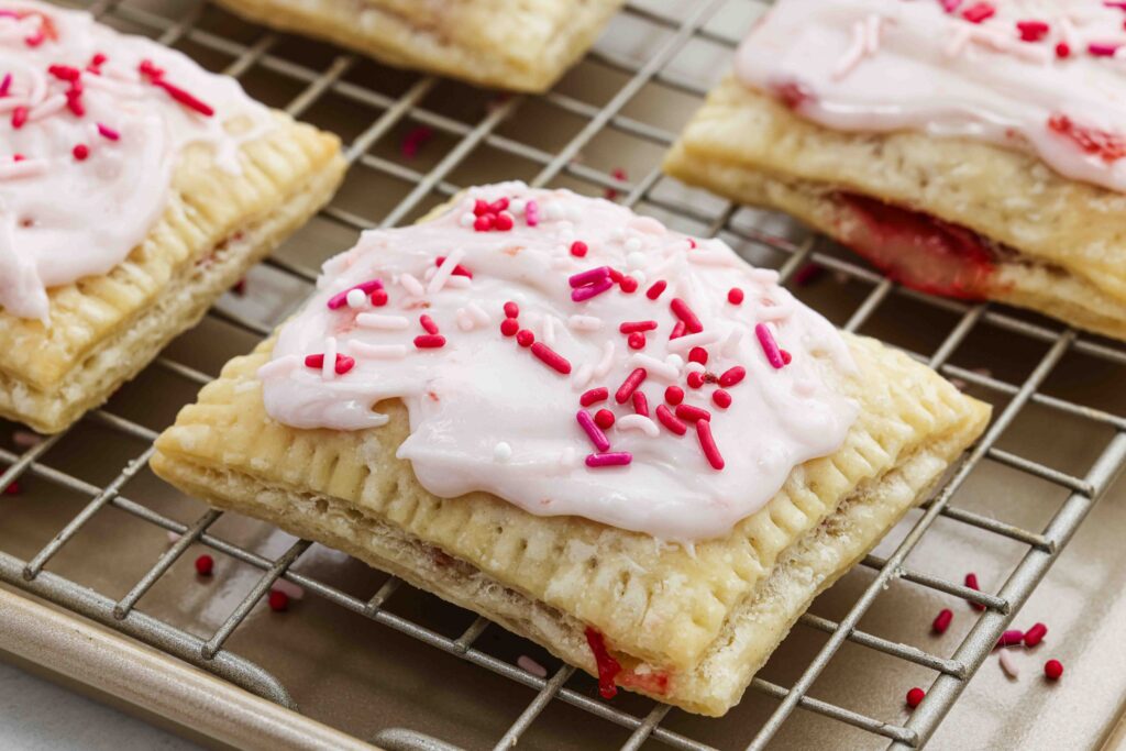 pop tarts on rack with pink icing and sprinkles
