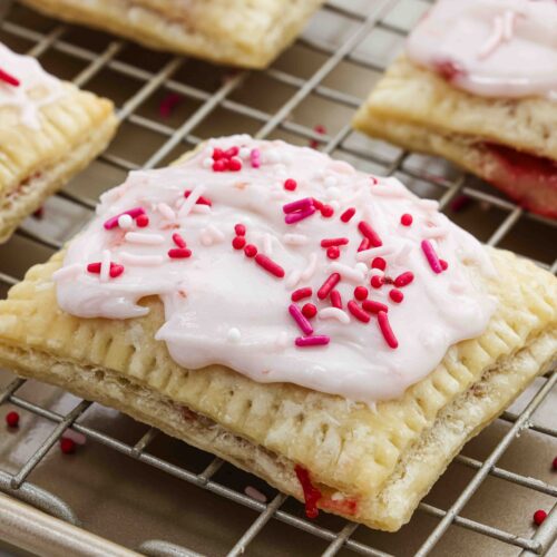 pop tarts on rack with pink icing and sprinkles