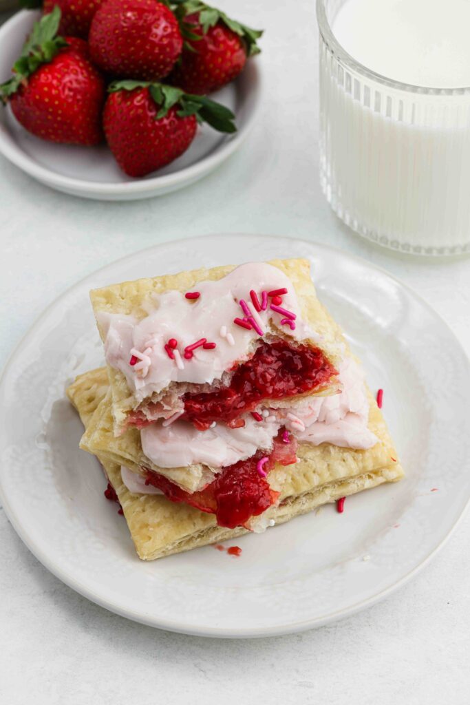 stacked pop tarts with strawberry filling.