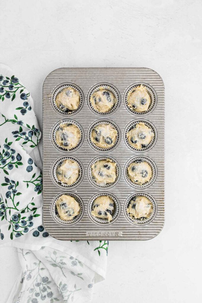 Blueberry muffins in baking tin.
