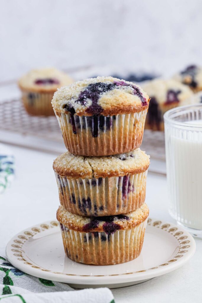 Gluten free blueberry muffin stacked on top of each other.