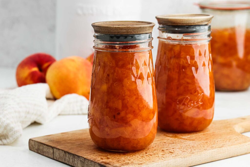 Two jars of peach jam