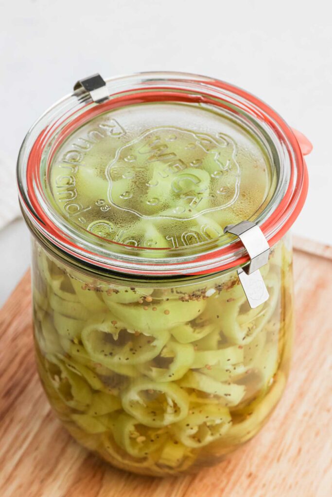 Glass jar on wooden board.