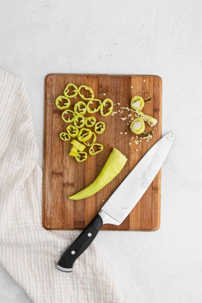 Removing seeds from banana peppers